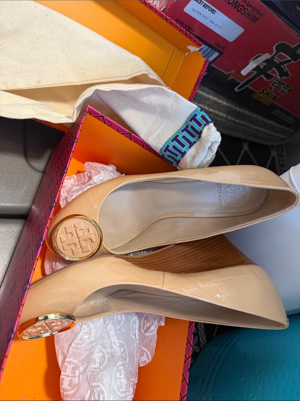 Tory Burch Nude Patent Leather Wedge Pumps with Logo Medallion